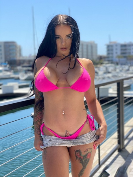 Payton Preslee, the curvaceous beauty of the moment displaying her enormous melons in a pink bikini.