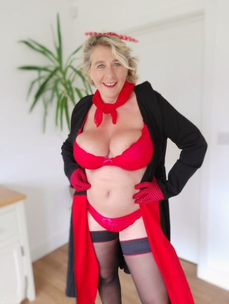 Plumby granny Camilla Creampie struts in her ample breasts while wearing pleated lingerie.