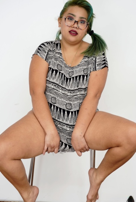 Thick body: Tall green-haired Asian girl, Manila Bey shows off her thick body and twats.