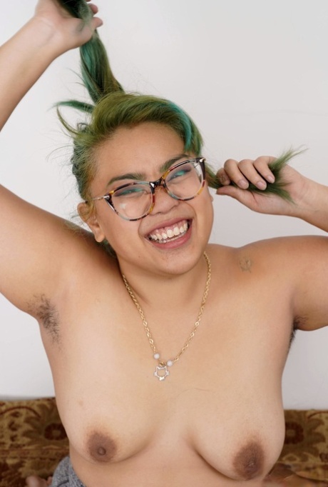 Asian sweetheart Manila Bey exhibits her oversized chest as she flaunts enormous abs.