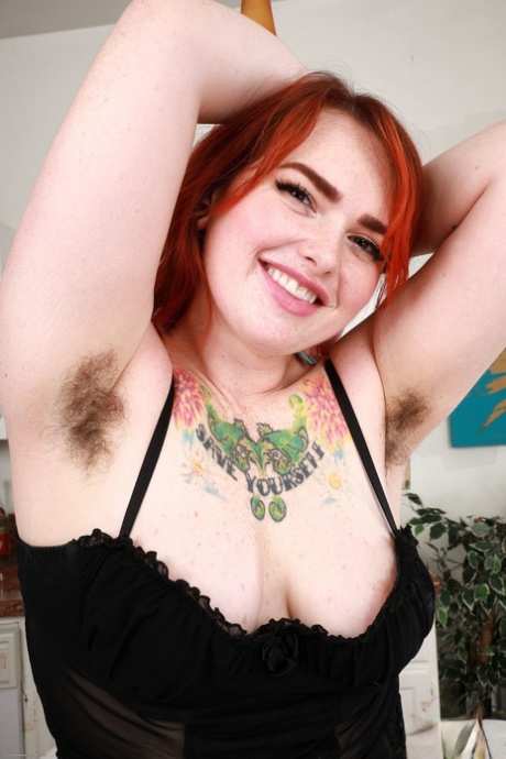 Chubby Ginger Adora Bell strips to reveal her curvy curves and hairy appearance.