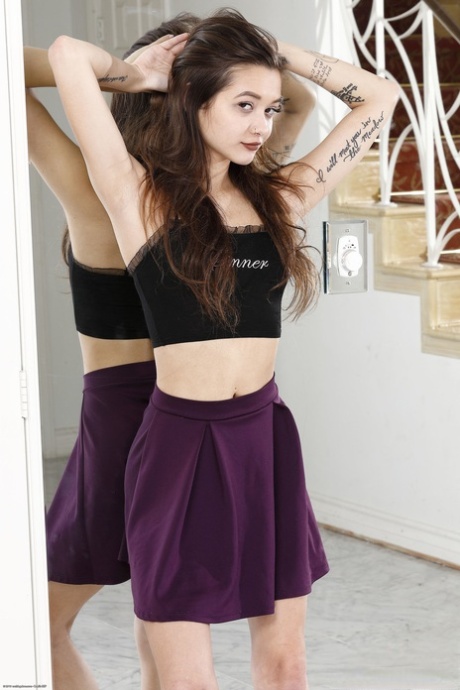 In a cute amateur act, Alex De La Flor extends her long legs and exhibits her furry cuntifully.