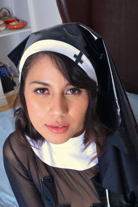 The attractive puma-like pussy of Penelope Reed is admired by the beautiful nun who puts her hair up close and personal.