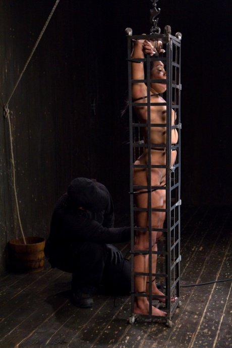 Exotic Ebony Yasmine De Leon Gets Bound And Locked In A Cold Metal Cage