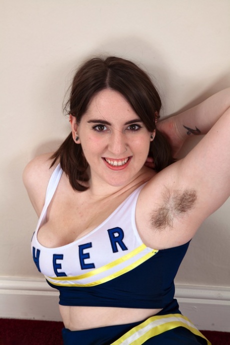 Chubby Cheerleader Beryl Aspen Unveils Her Big Tits And Furry Vagina