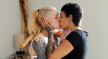 The female who has a big ass is having an intimate encounter with a lesbian woman of short hair, known as Cam Damage.