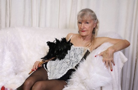 Horny Old Granny In A Maid Outfit Linda Jones Strips Her Clothes & Masturbates