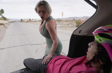 In the middle of a MILF, Dee Williams emits a BJ while riding on another man's face and penis.