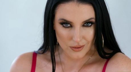 In a stunning MILF, Angela White pleasures herself with her lubricated tits while smoking big fish.