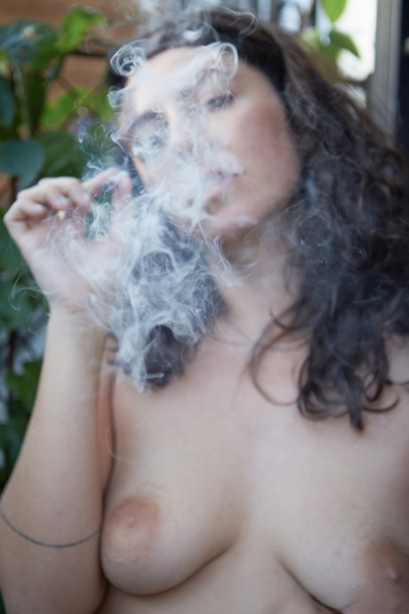 Smoking a pissy is Nikki Silver's hobby, and she can be seen in public while posing in the nude.