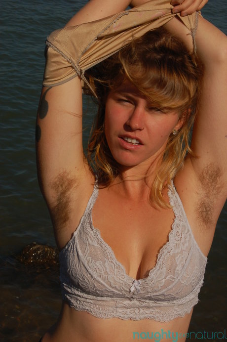 Saucy Young Slut Lilah Strips By The Water And Unveils Her Hairy Body