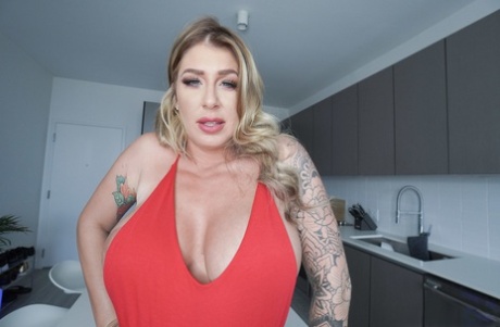 MILF, a tattoo artist with big tits, is subject to a large penis after being stripped down by Lolly Dames.