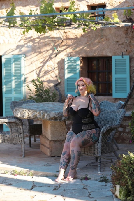 The tattooed fatty gal pal, Galda Lou, exhibits her massive booty and breasts while outdoors.