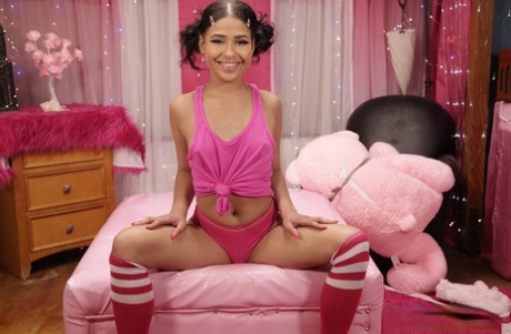 Pigtailed Teen Ryder Rey Posing In Her Pink Top, Panties & Over-the-knee Socks