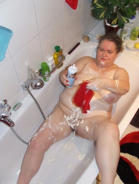 BBW Birgid Strips & Masturbates With Whipped Cream & A Glass Toy In A Bathroom
