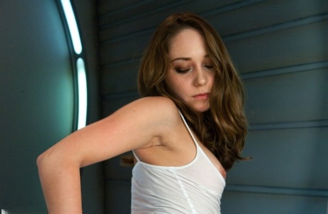 As Remy LaCroix, a short boy in his early years, bends over and is examined by a sex machine,