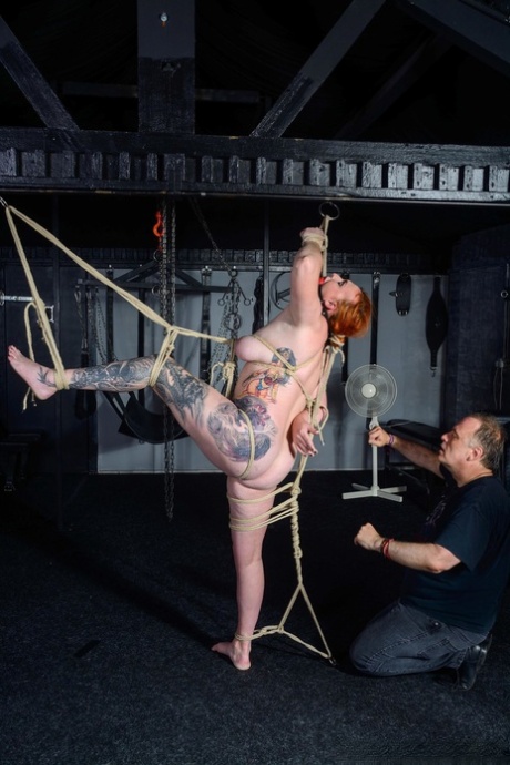 Tight control: Fatty Chloe Davies is subject to tying up and ball-gagging by her master.