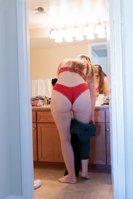 Amateur fatty named Jacklyn is captured on film changing in the bathroom.