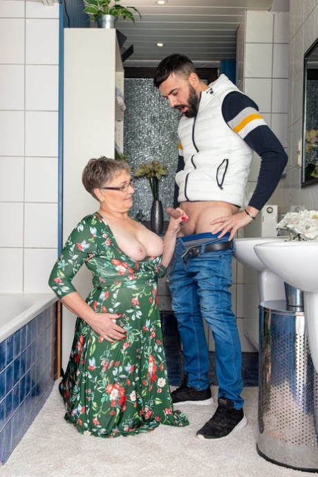 Short granny with eyeglasses Petra sucks & fucks a young dick in the bathroom