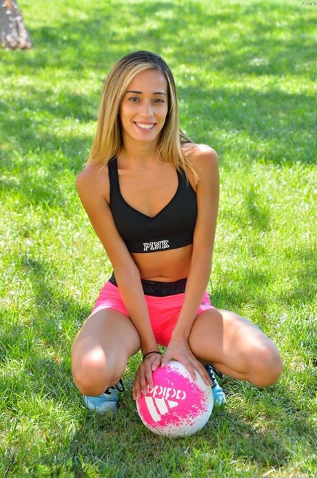 Averie, a slim girl who plays football with the ball and removes her shorts in public, is quite slender.