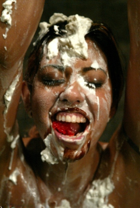 On her body, Asian Satine Phoenix exfoliates with cream and chocolate while riding on a silky ride.