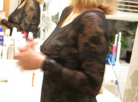 Modest amateur MILF with curvaceous bodies gets captured on camera while changing in public.