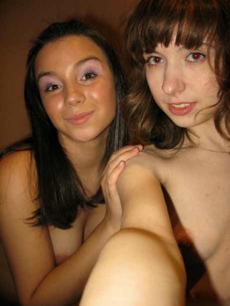 Nude selfies: Amateur lesbians show off their titties.