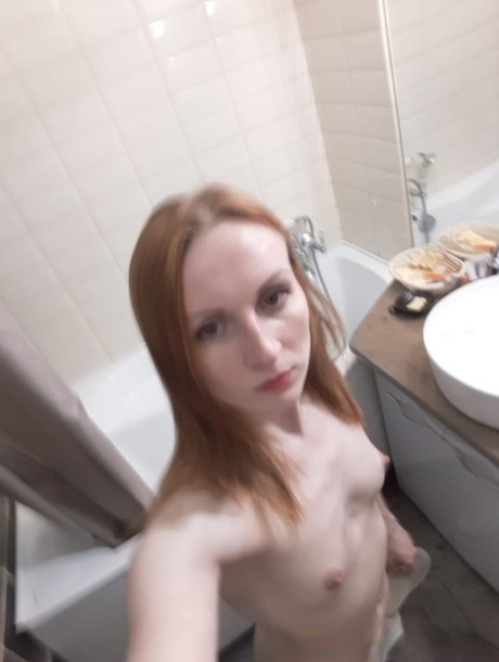 I see amateur ginger in the mirror, with her small breasts and svelte build.