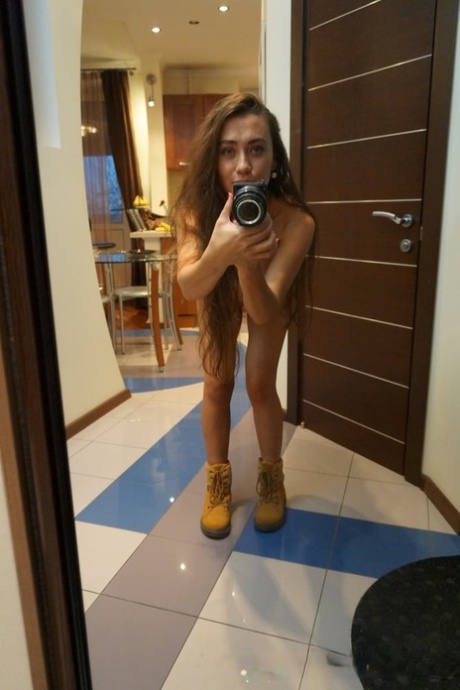 Alluring brunette teen flaunts her curvy ass all nude while taking selfies