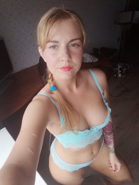 Beautiful Amateur Doll Takes Selfies While Posing In Her Turquoise Lingerie