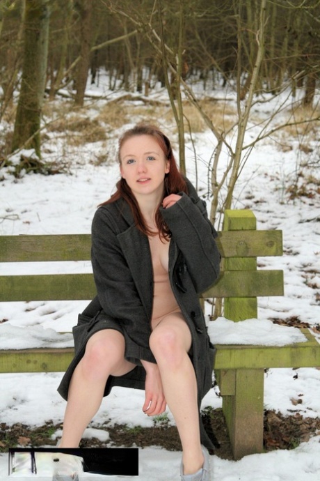 Amateur Bhala Sada wearing nothing under her coat flashes her tits in the cold