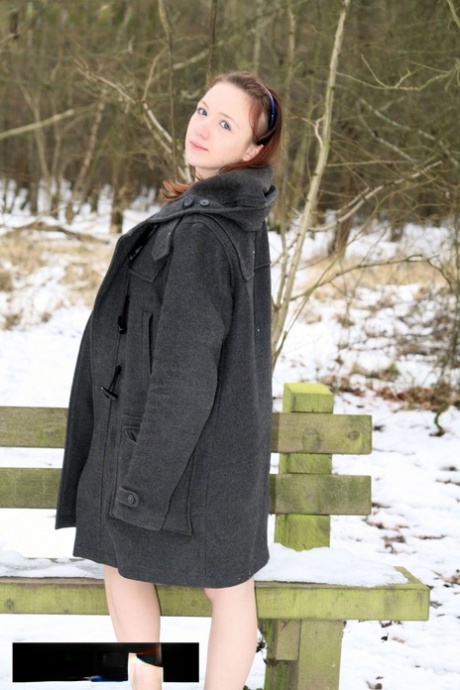 Amateur Bhala Sada wearing nothing under her coat flashes her tits in the cold