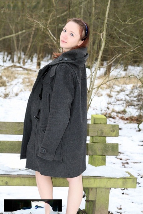 Amateur Bhala Sada wearing nothing under her coat flashes her tits in the cold