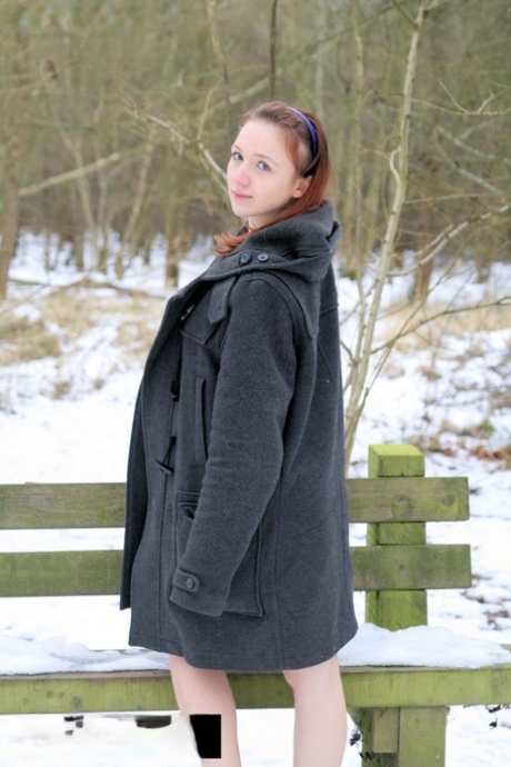 Amateur Bhala Sada wearing nothing under her coat flashes her tits in the cold