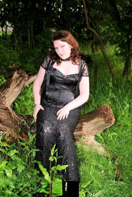 Nature's beauty: Chubby brunette MILF wearing a pretty satin and lace outfit.