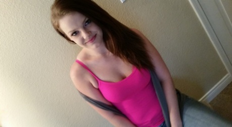 Adorable Amateur Babe Posing In Her Hot Pink Shirt And Tight Jeans