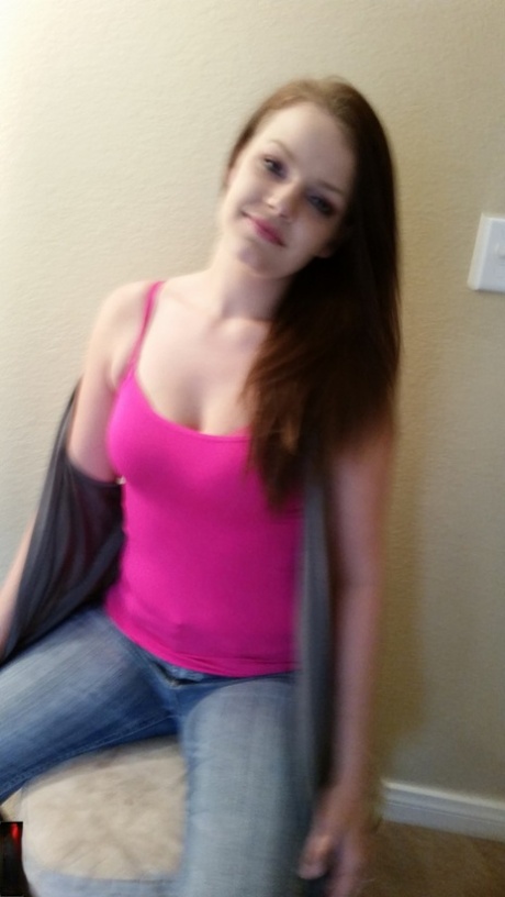 Adorable Amateur Babe Posing In Her Hot Pink Shirt And Tight Jeans