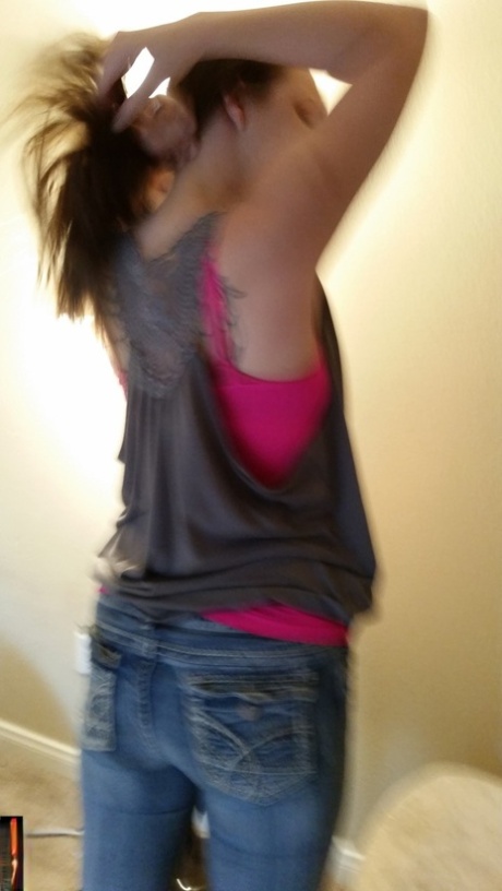 Adorable Amateur Babe Posing In Her Hot Pink Shirt And Tight Jeans