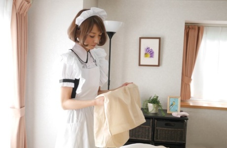 A Japanese maid named Erina Takigawa lost her panties and had her pussy fingered.