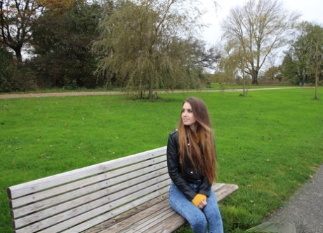 Long-haired Teen In A Leather Jacket Puts A Hard Dick In Her Mouth In A Park