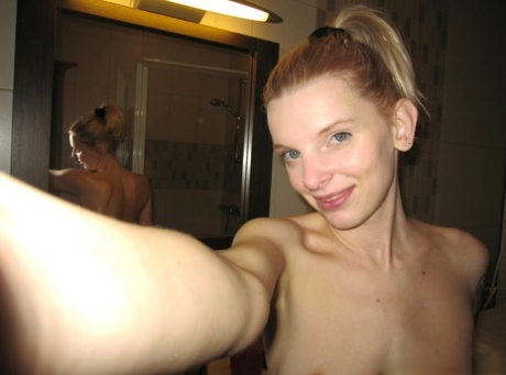 A ponytailed novice captures nude selfies of her adorable natural tits.