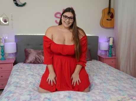 Brunette BBW Fit Sid Takes Off Her Red Dress To Show Her Plump Body On Her Bed