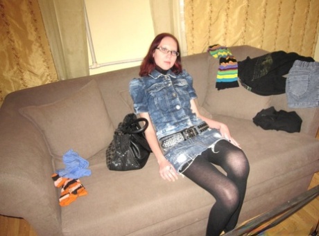 Kinky is an amateur who fondles her natural tits and hard nips at home.