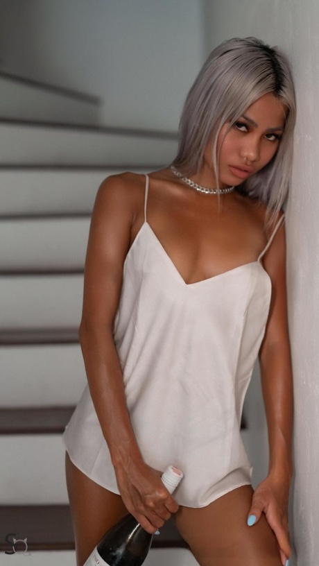 Platinum Blonde Teen Riri Shows Her Dark Skinned Body And Poses Nude