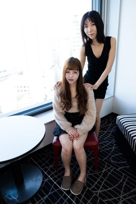 Japanese Lesbians Ai Nakamori & Kayo Miura Sharing A Purple Toy On The Sofa