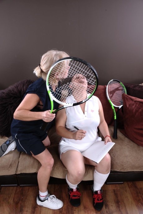 Despite having a mature coach and large toys, Kimberly's male counterpart is the lesbian tennis player with her big tits and plastic toys.