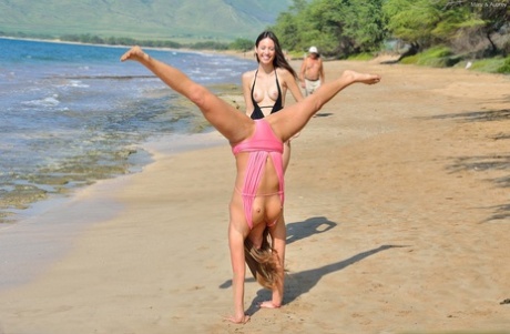 On the beach, Aubrey and Mary are naked as they pose in amateur bikini models who are smoking hot.