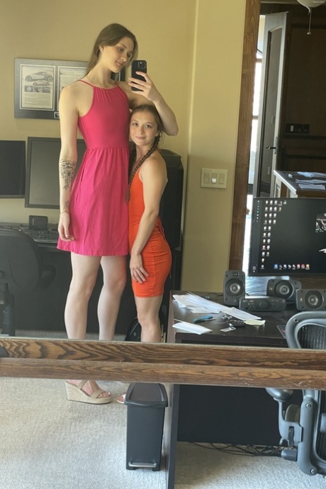 Tall lesbian Olivia does her short GF's hair & lets her toy with a vibrator