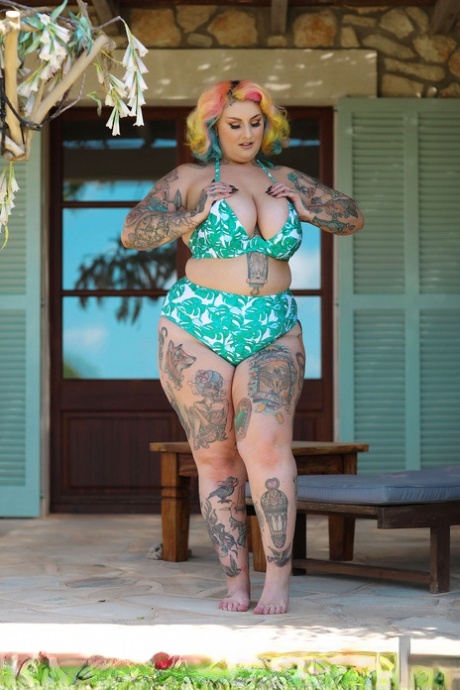 Chubby Galda Lou displays her tattooed body in every part of her nude frame.