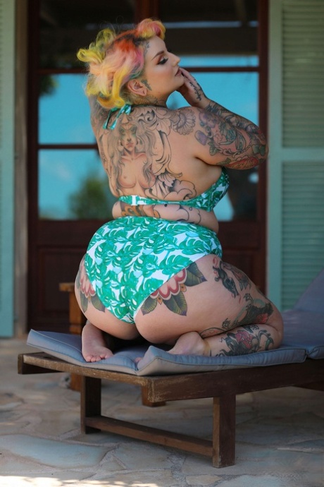 Full of tattoo: Chubby Galda Lou shows off all the parts around her naked body with a tattoo.